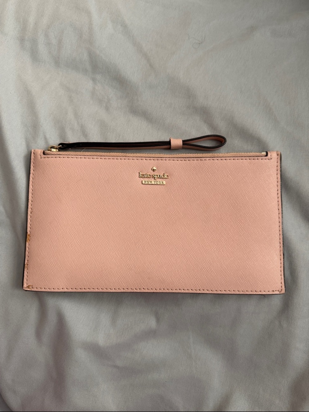 kate spade blush pink saffiano wristlet clutch with gold logo
